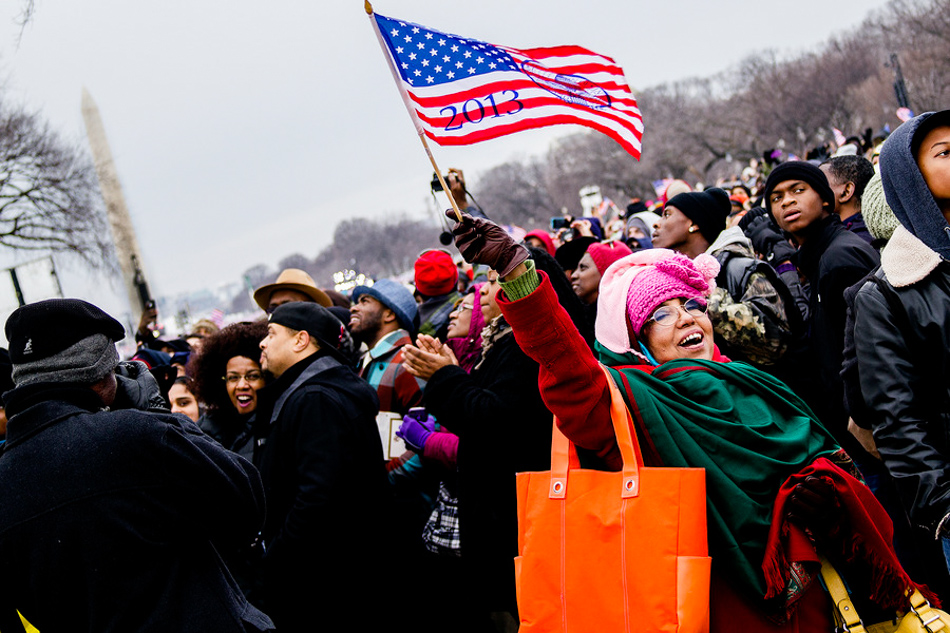 Chuck Miller/Staff PhotographerMissouri resident Noor Khan waves a Barack Obama 2013 inauguration flag through the air during Monday's 57th presidential inauguration in Washington D.C. Noor came alone to the ceremony traveling all the way from Missouri to see it.