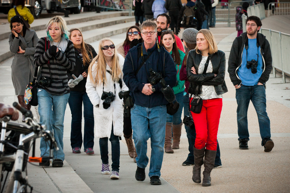 From left, Taryn Wattles, Leah Erber, Melissa Richards, Brooke Mayle, Kent Miller, Stephen Pugh, Katie Priehs, Jordon Oster, Kirsten Kearse and Neil Barris walk past barricades near the Capitol Building at the end of the second day of the three-day workshop.